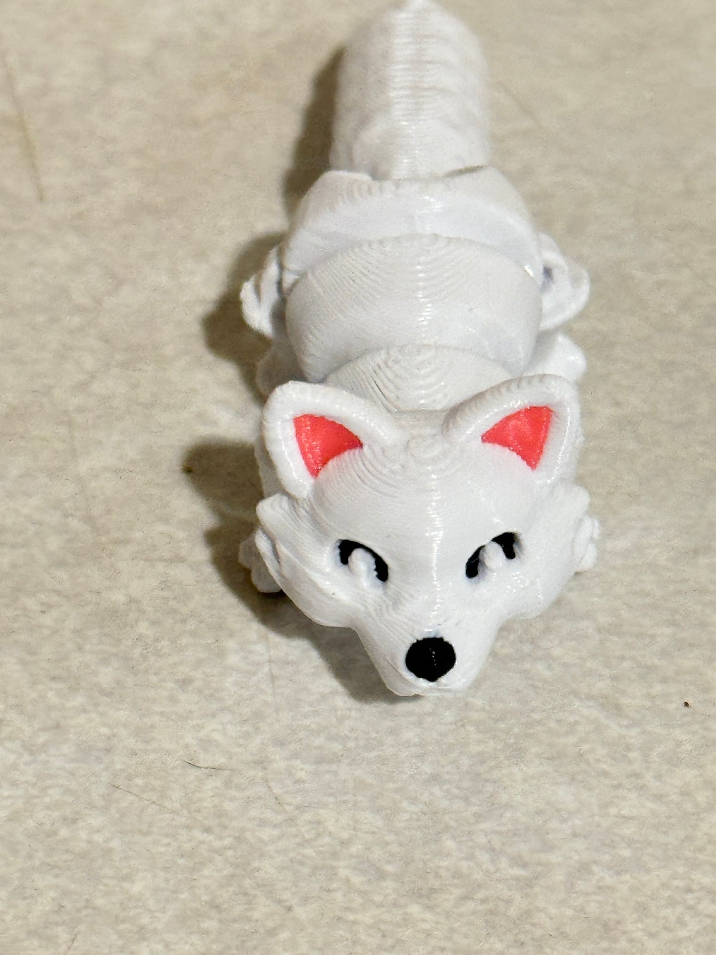 Discover Whimsical Wonders: Articulated Lazy Arctic Fox 3D Print!