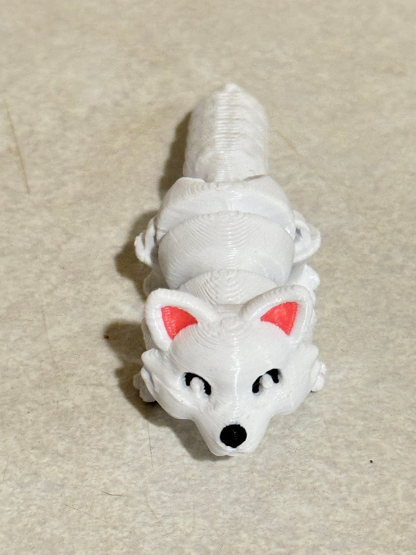 Discover Whimsical Wonders: Articulated Lazy Arctic Fox 3D Print!