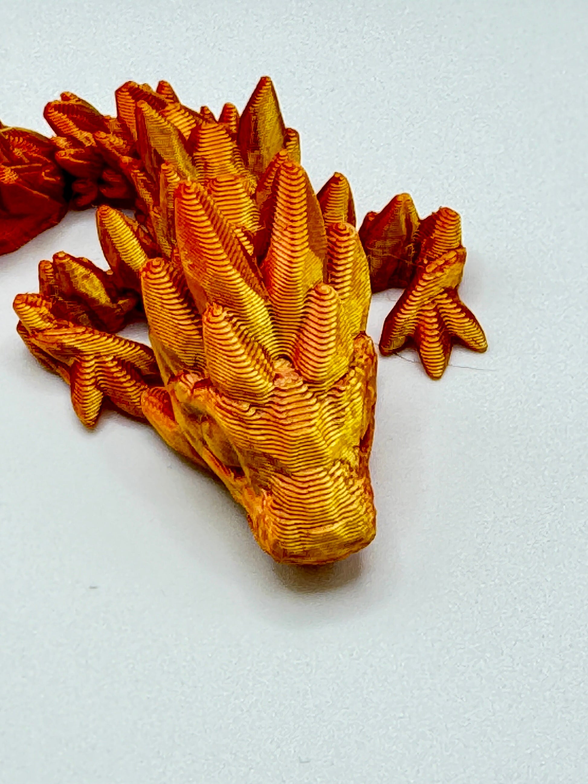 Discover Adorable Magic with our Articulated Baby Gemstone Dragon - 3D Printed in Gold with Cinderwing Design!