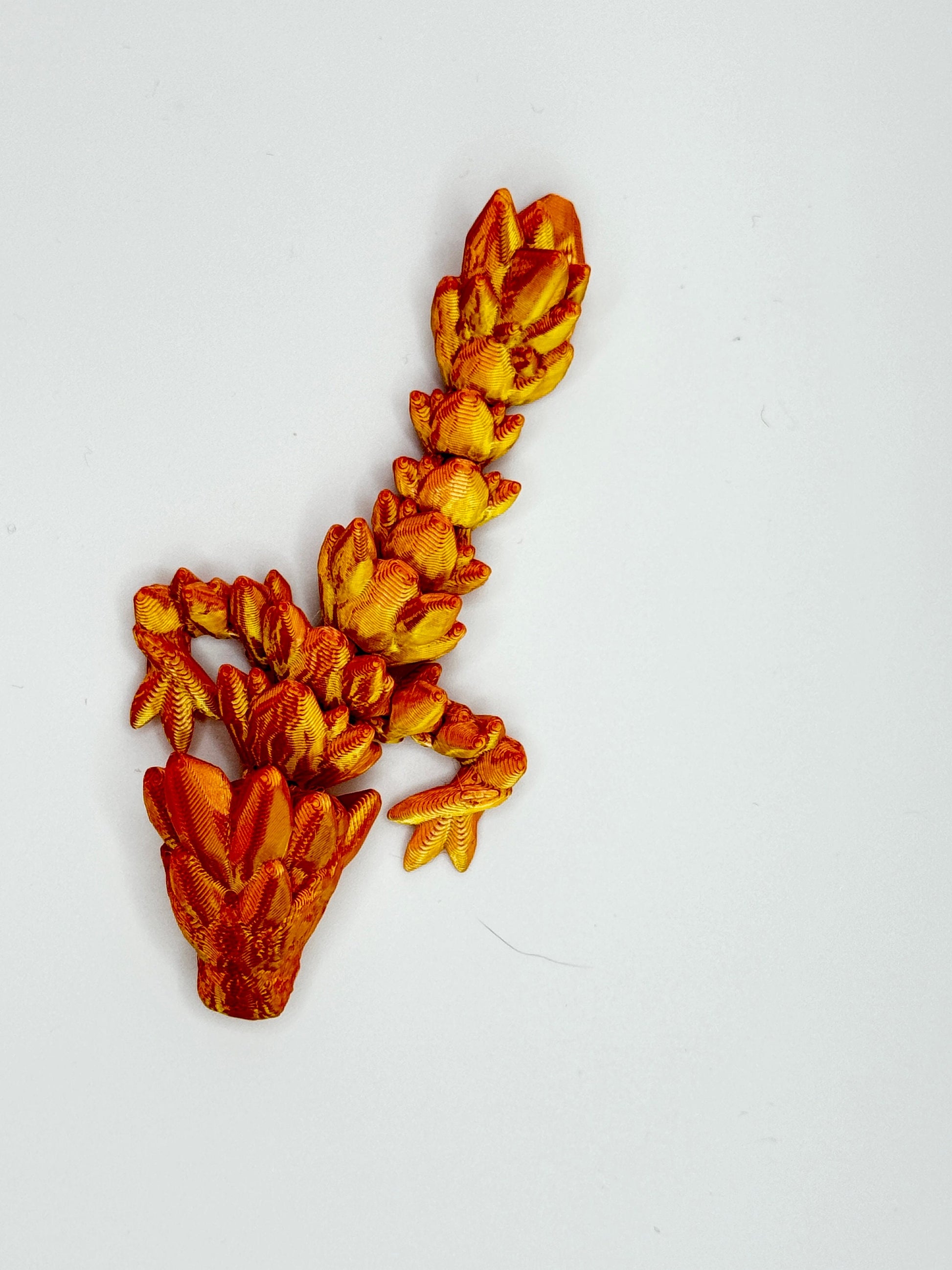 Discover Adorable Magic with our Articulated Baby Gemstone Dragon - 3D Printed in Gold with Cinderwing Design!