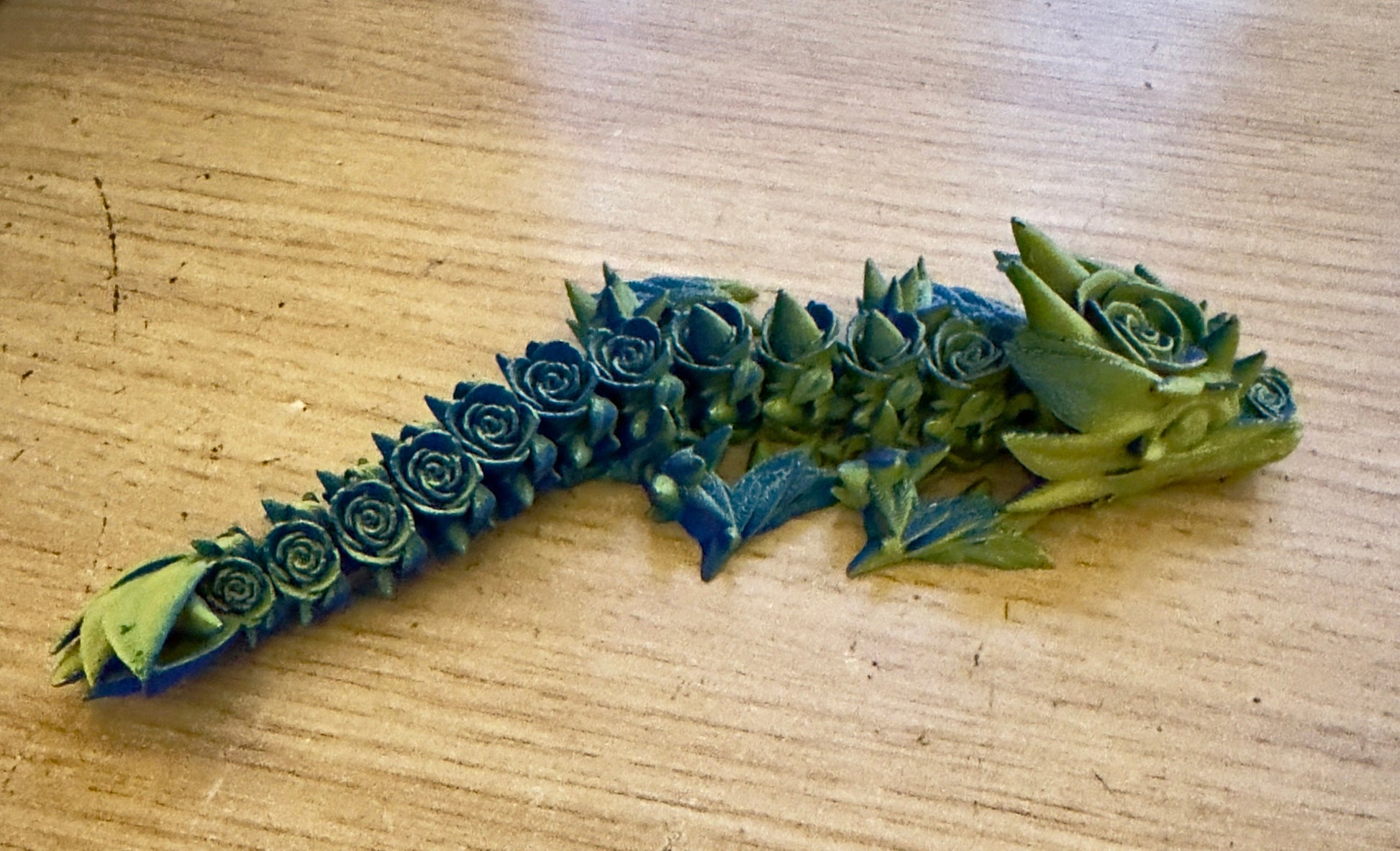 Elevate Your Collection with the Articulated Baby Rose Dragon - 3D Printed in Yellow and Blue Cinderwing Design!