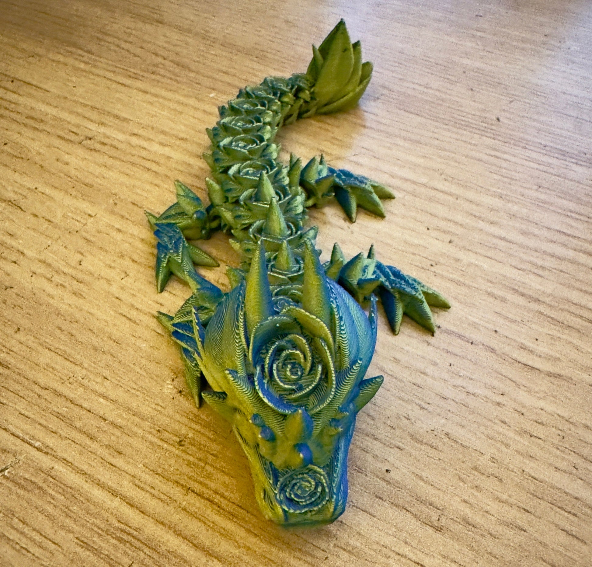 Elevate Your Collection with the Articulated Baby Rose Dragon - 3D Printed in Yellow and Blue Cinderwing Design!