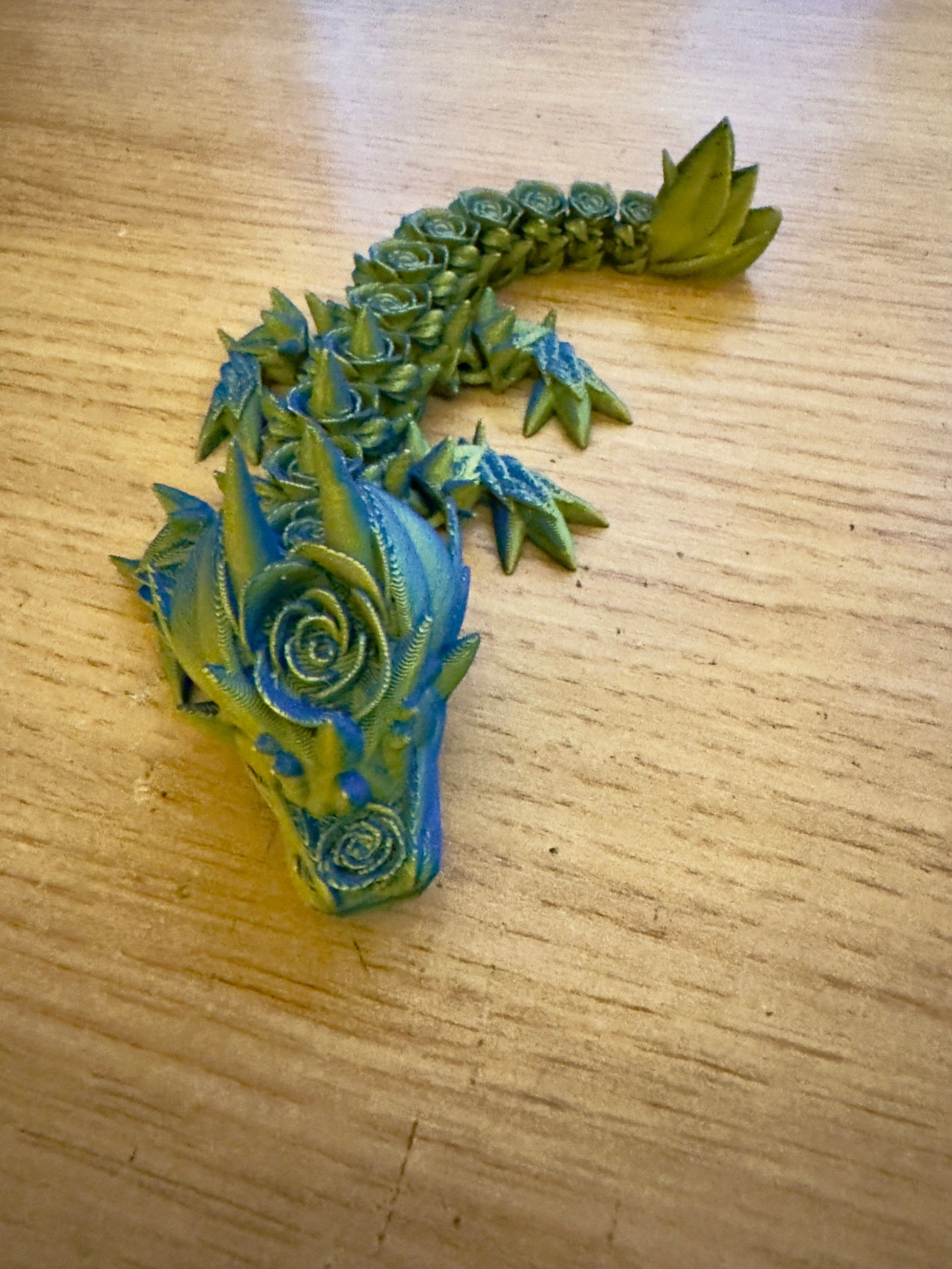 Elevate Your Collection with the Articulated Baby Rose Dragon - 3D Printed in Yellow and Blue Cinderwing Design!