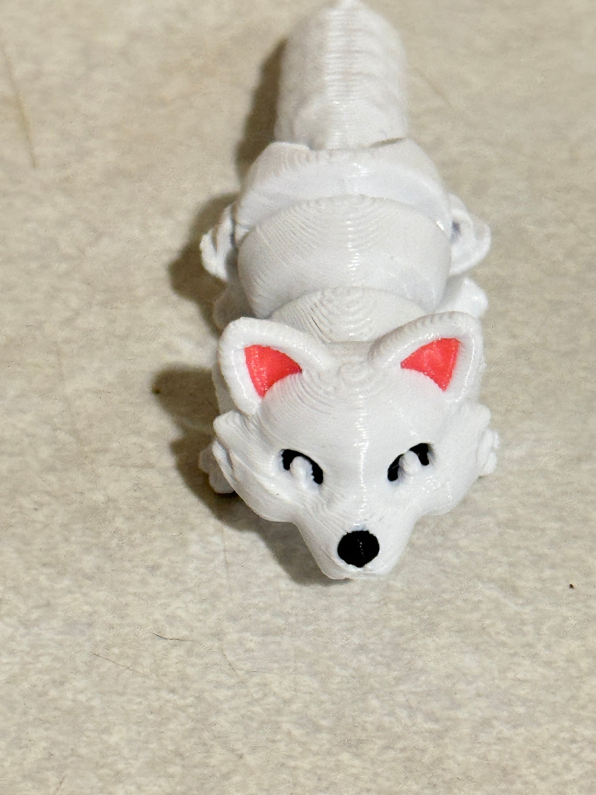 Discover Whimsical Wonders: Articulated Lazy Arctic Fox 3D Print!