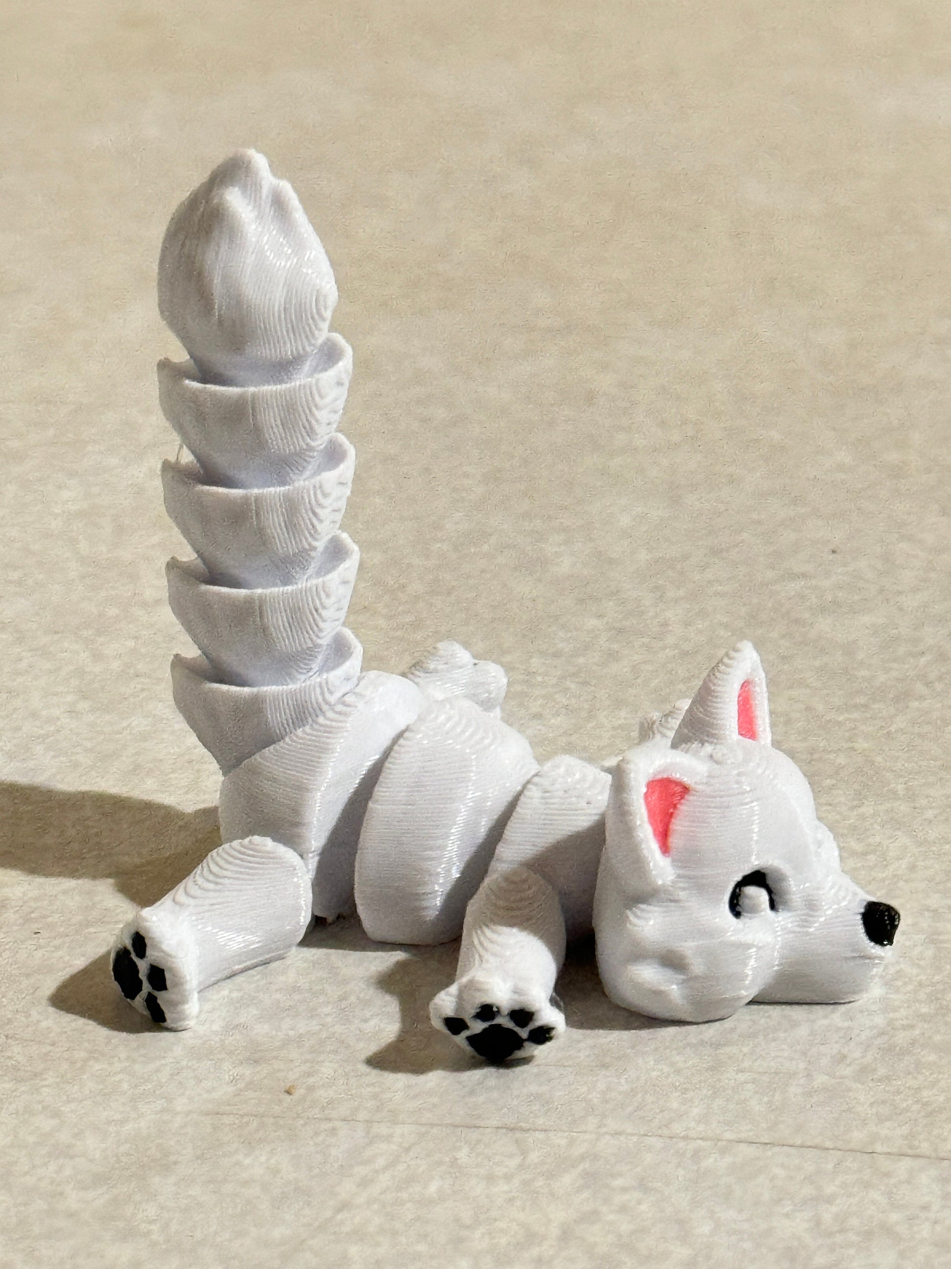 Discover Whimsical Wonders: Articulated Lazy Arctic Fox 3D Print!