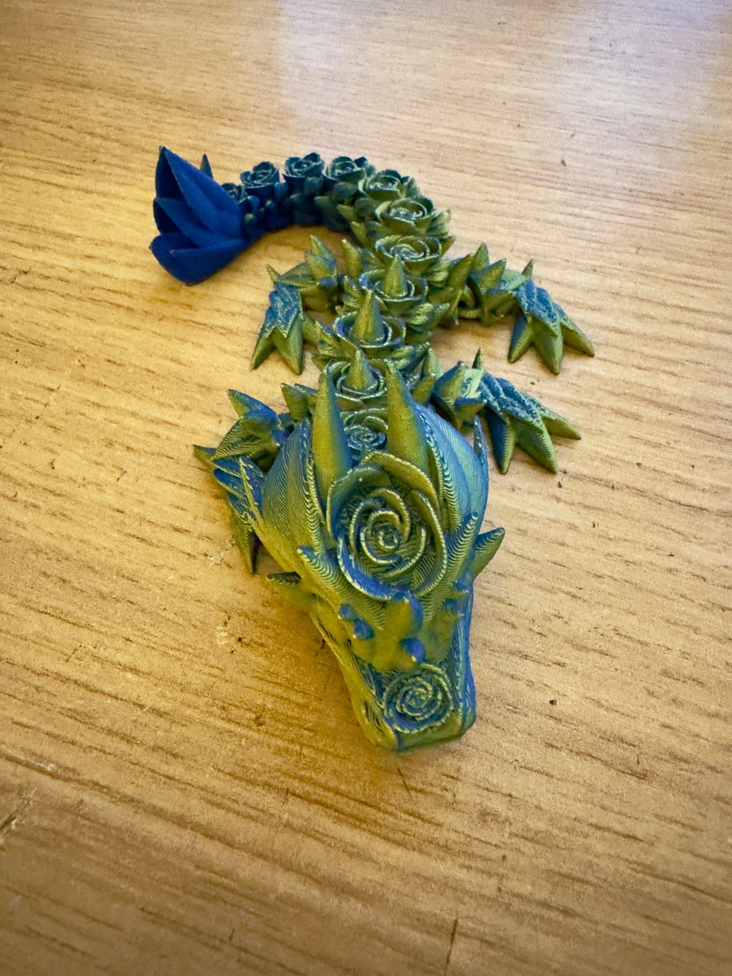 Elevate Your Collection with the Articulated Baby Rose Dragon - 3D Printed in Yellow and Blue Cinderwing Design!