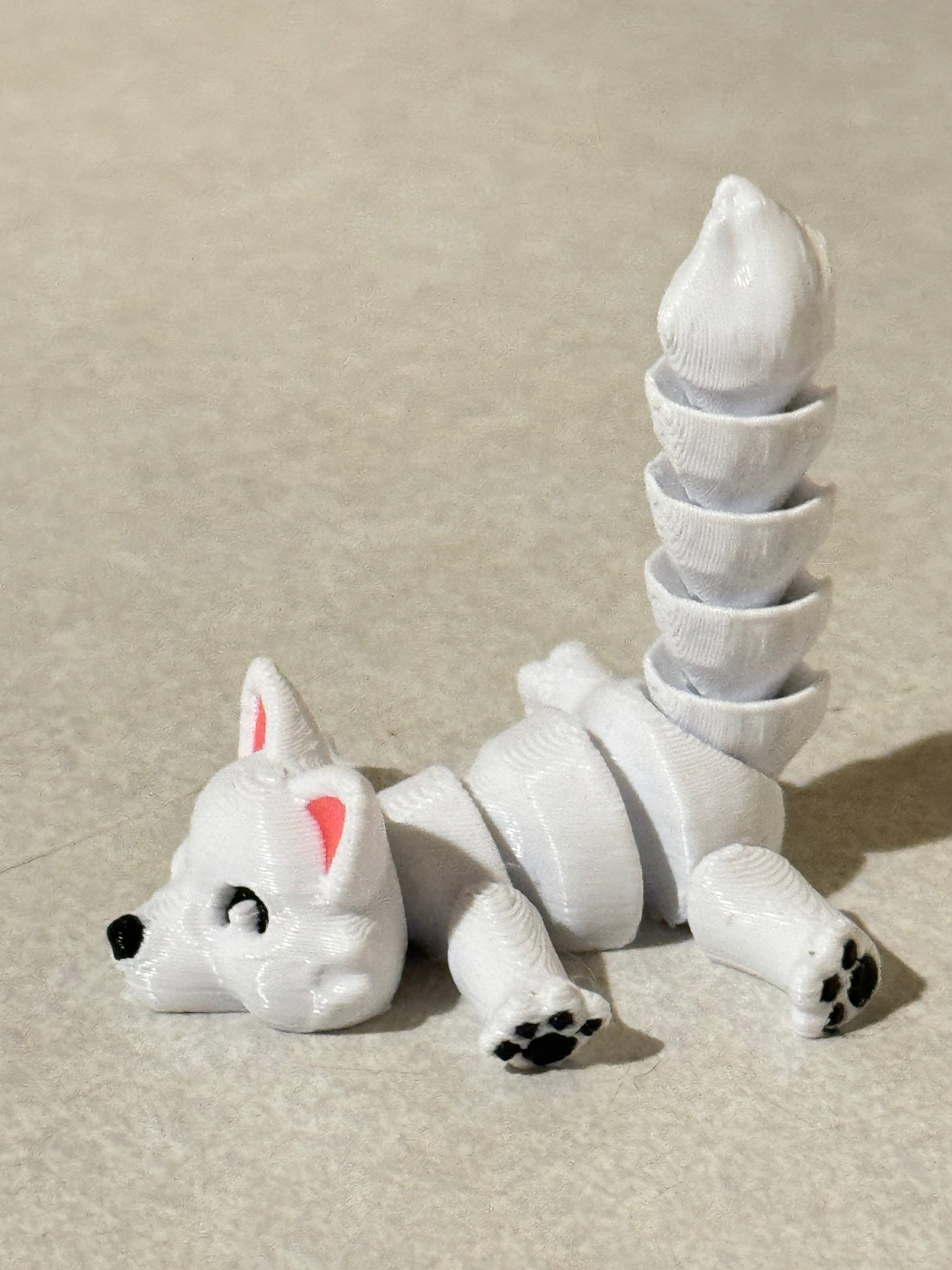 Discover Whimsical Wonders: Articulated Lazy Arctic Fox 3D Print!