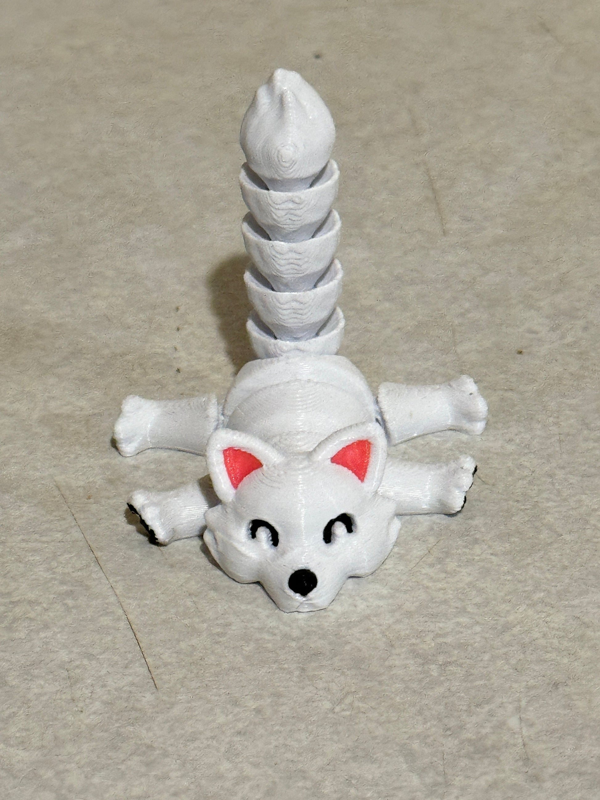 Discover Whimsical Wonders: Articulated Lazy Arctic Fox 3D Print!