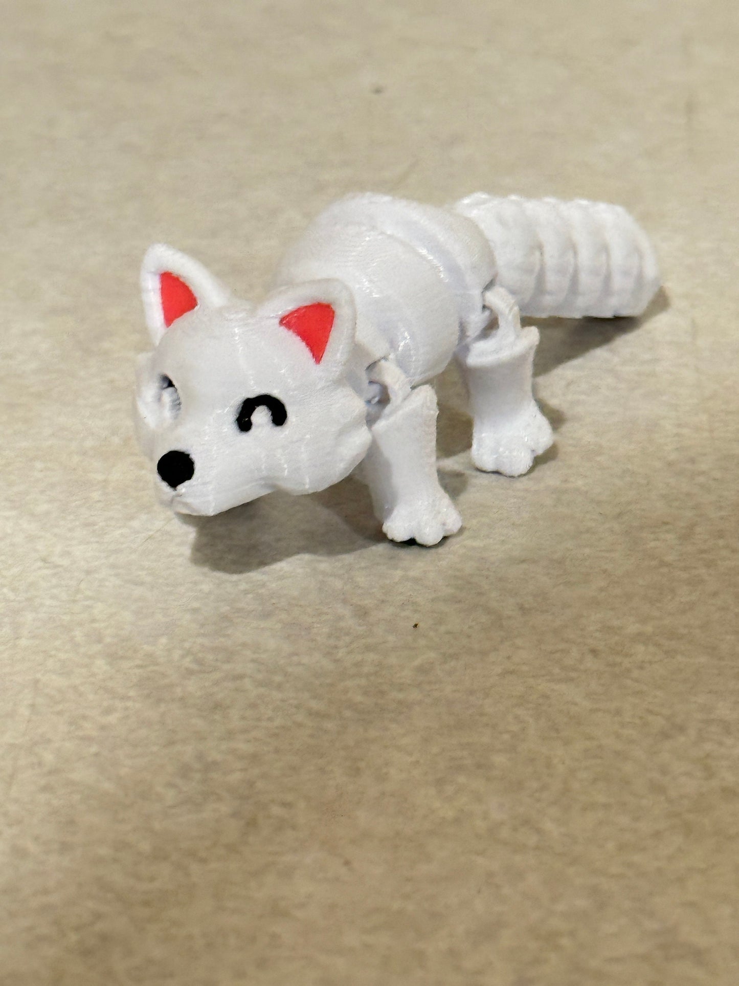 Discover Whimsical Wonders: Articulated Lazy Arctic Fox 3D Print!