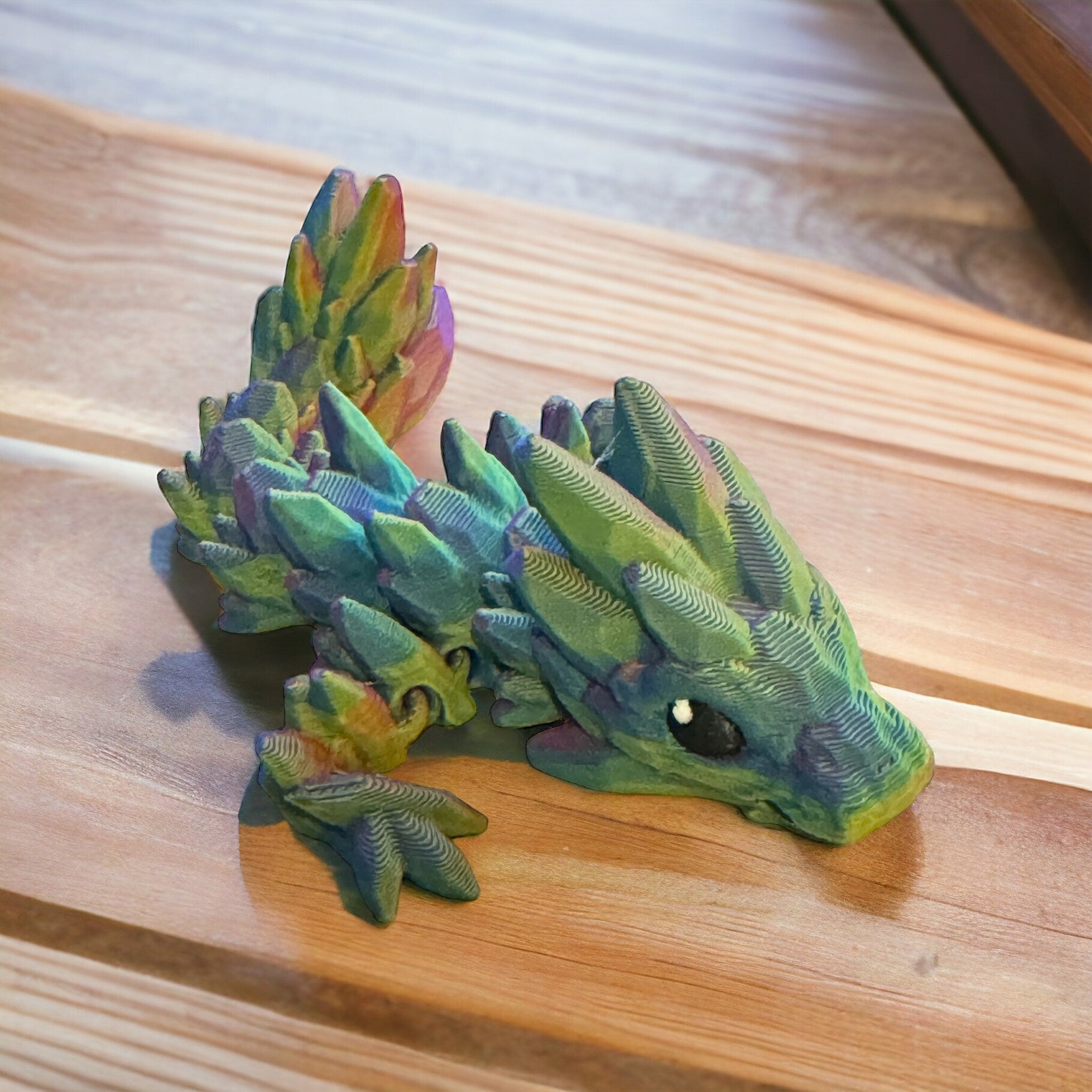 Enchanting Elegance: Meet the Baby Gemstone Tadling Keychain Dragon in Rosy Cloud Delight